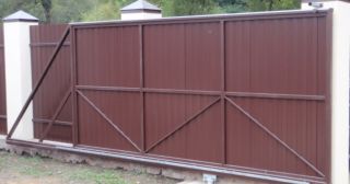 Купить откатные ворота из профнастила Усть-Илимск, цена от 1775 руб.