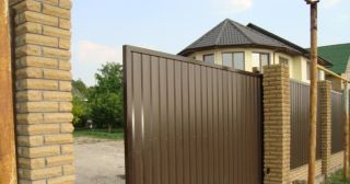 Купить откатные ворота из профнастила Усть-Илимск, цена от 1775 руб.